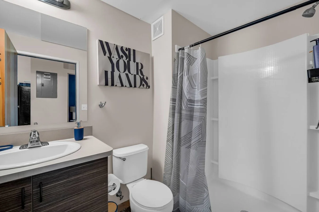You feel a sense of calm as you enter the bathroom, where the thoughtful design and high-quality materials create a serene environment.