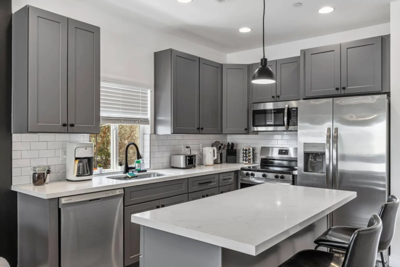 The kitchen’s open layout allows you to move freely as you prepare meals, with everything you need at your fingertips.