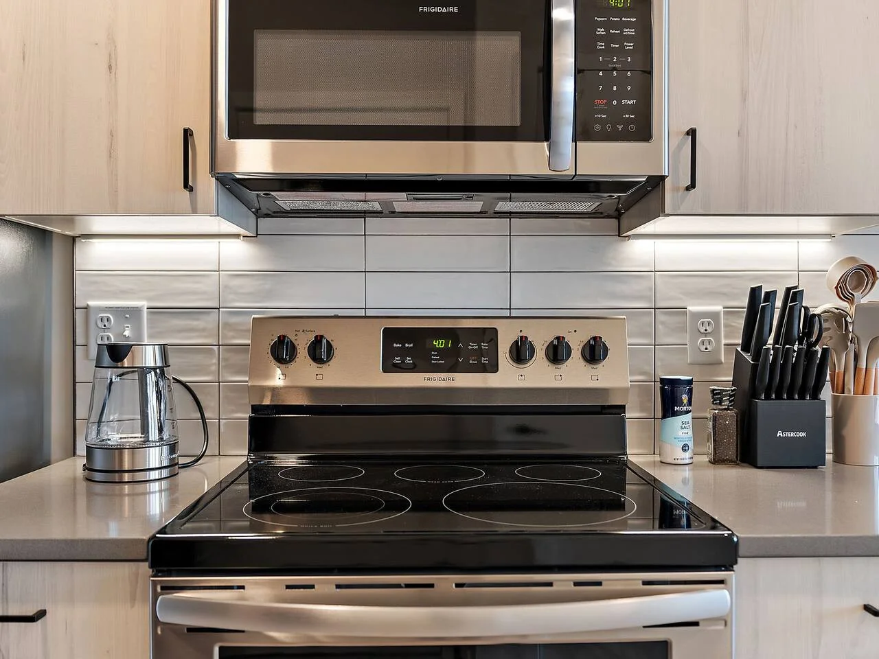 The kitchen invites you to experiment with new recipes, offering a stylish and practical space to cook and create.
