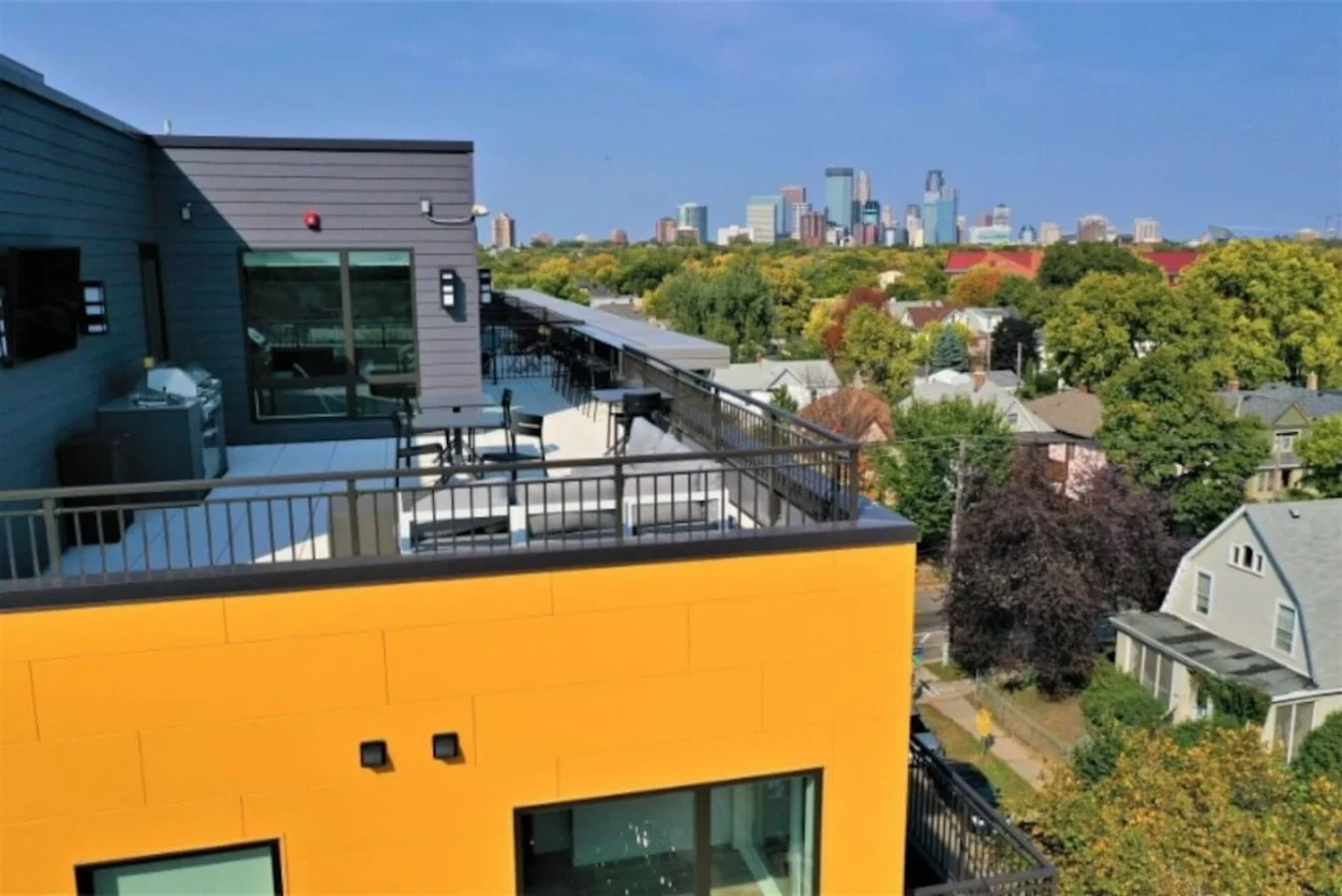 The house’s exterior is a blend of modern and classic design elements, creating a welcoming and stylish facade.