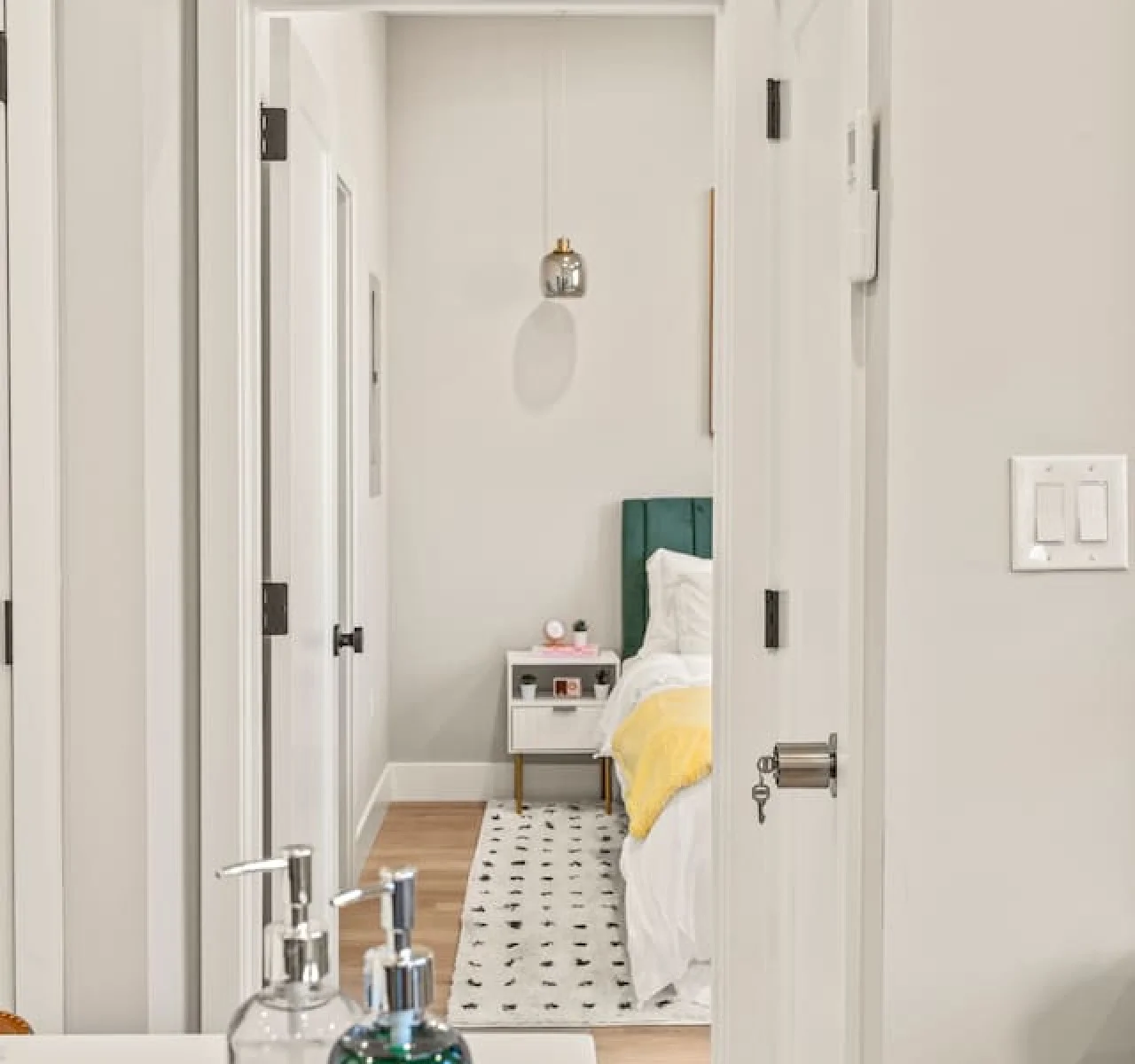As you enter the bedroom, the comfortable bedding and peaceful atmosphere create the perfect retreat from the day.