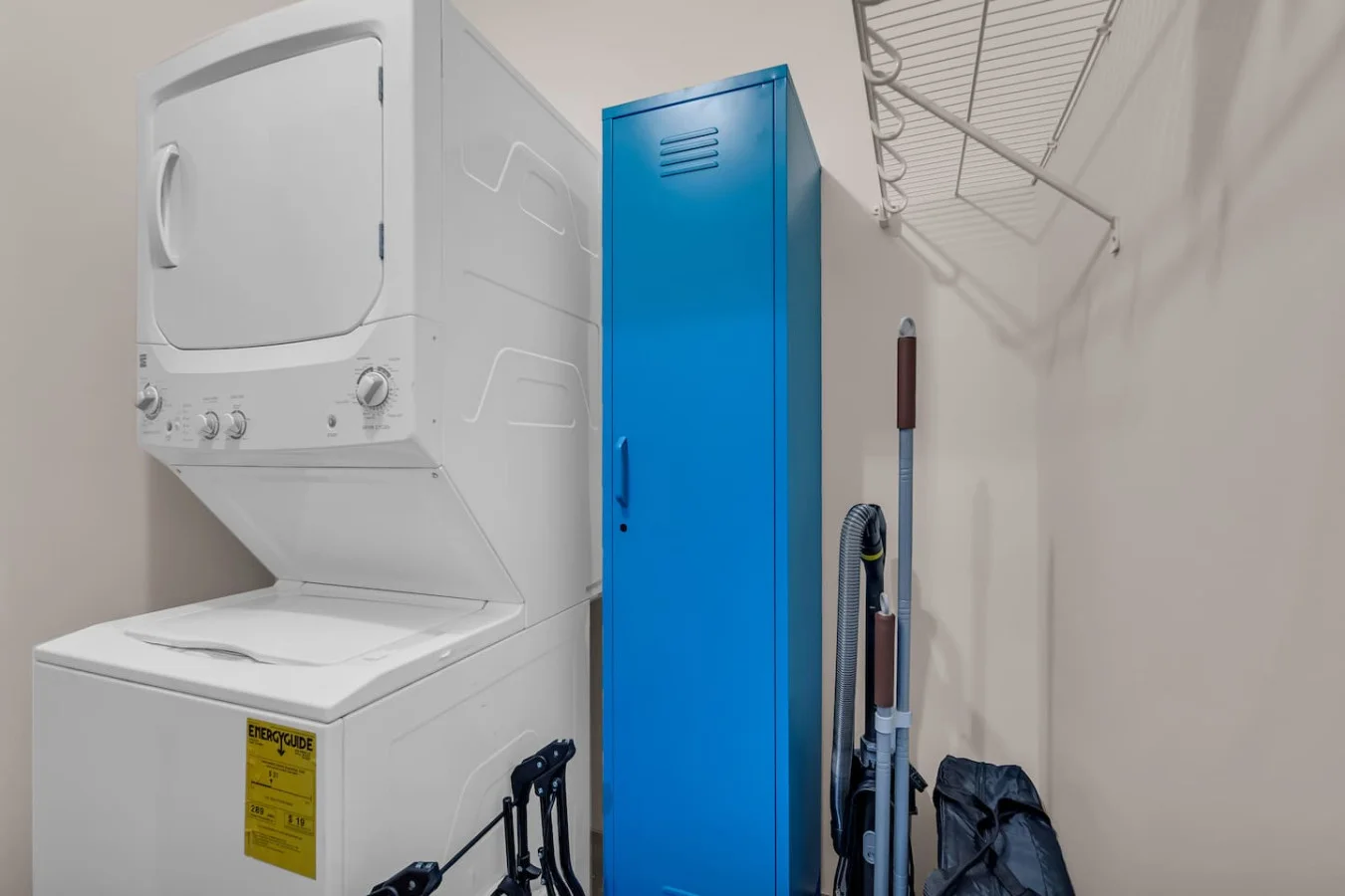 Convenient laundry room with washer, dryer, and all necessary supplies, making it easy to take care of your laundry needs.