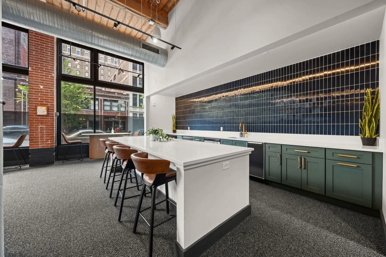 Shared kitchen space available to guests on the ground floor, perfect for hosting small gatherings.