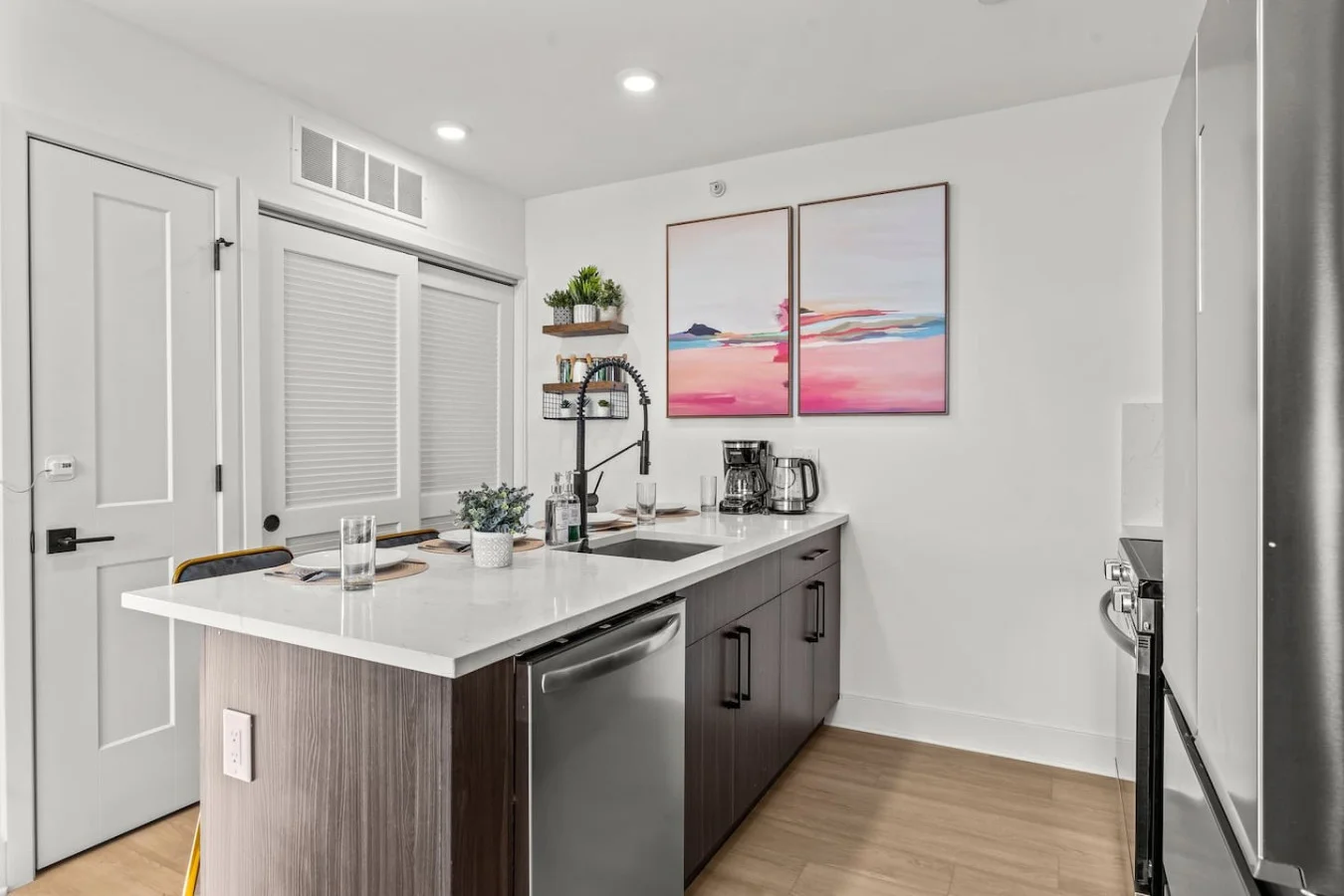 The kitchen’s open layout allows you to move freely as you prepare meals, with everything you need at your fingertips.