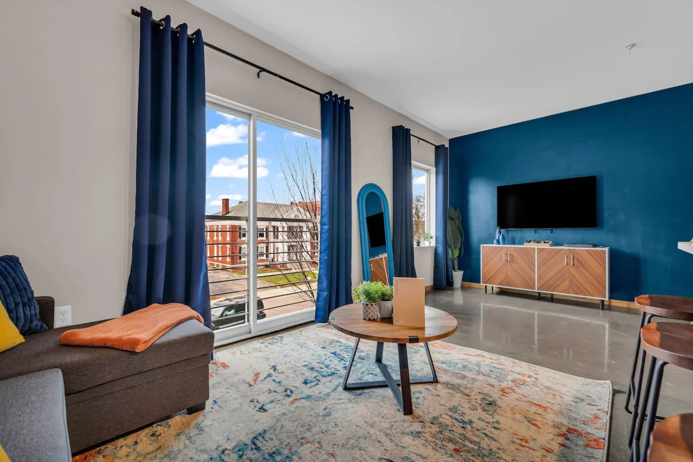 Spacious living room with stylish decor, perfect for unwinding after a day of exploring the local area.