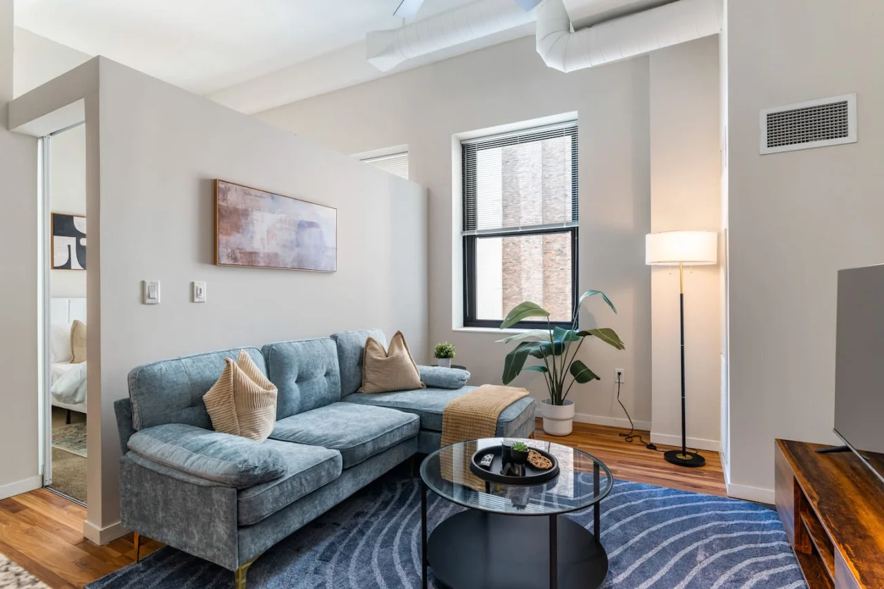 As you take a seat in the living room, the comfortable furniture and tasteful design make it easy to unwind.