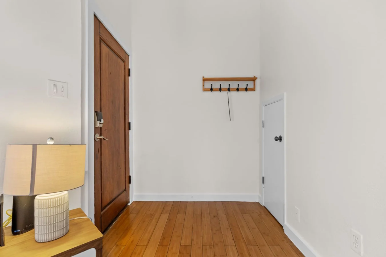 Private entry with coat hooks for an easy, organized arrival