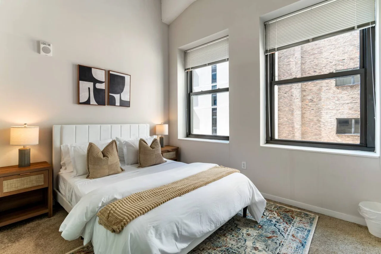 As you enter the bedroom, the sophisticated decor and plush bedding create a space where you can truly unwind.