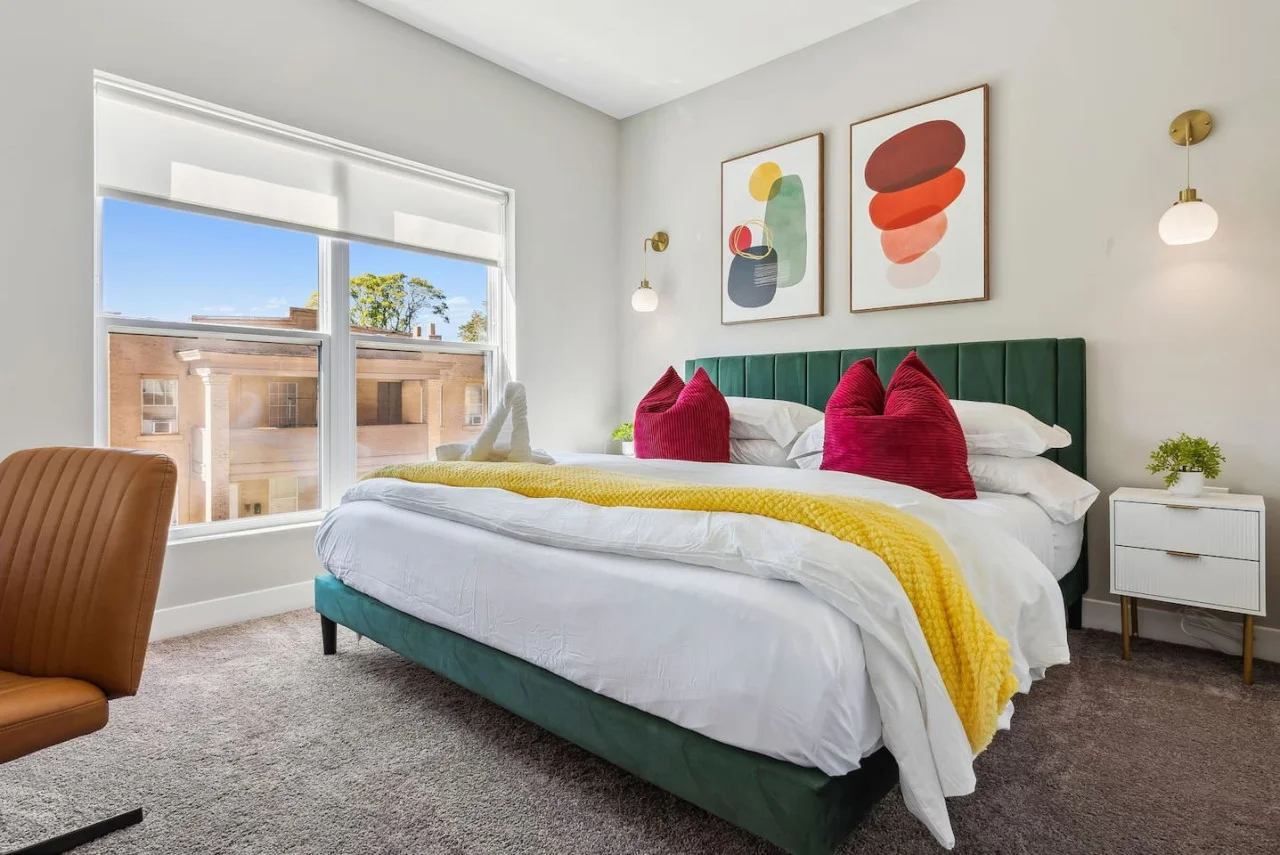 The king bed is the centerpiece of the room, offering a plush and inviting space where you can rest and recharge.