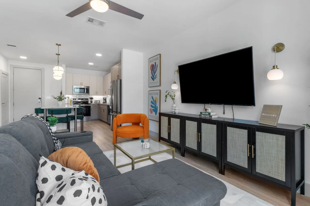 As you take a seat in the living room, the comfortable furniture and tasteful design make it easy to unwind.