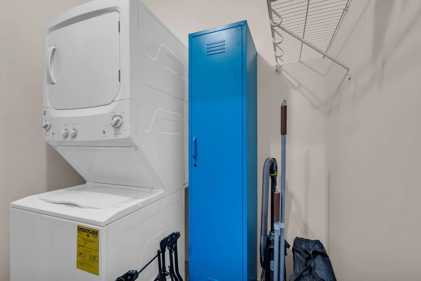 Convenient laundry room with washer, dryer, and all necessary supplies, making it easy to take care of your laundry needs.