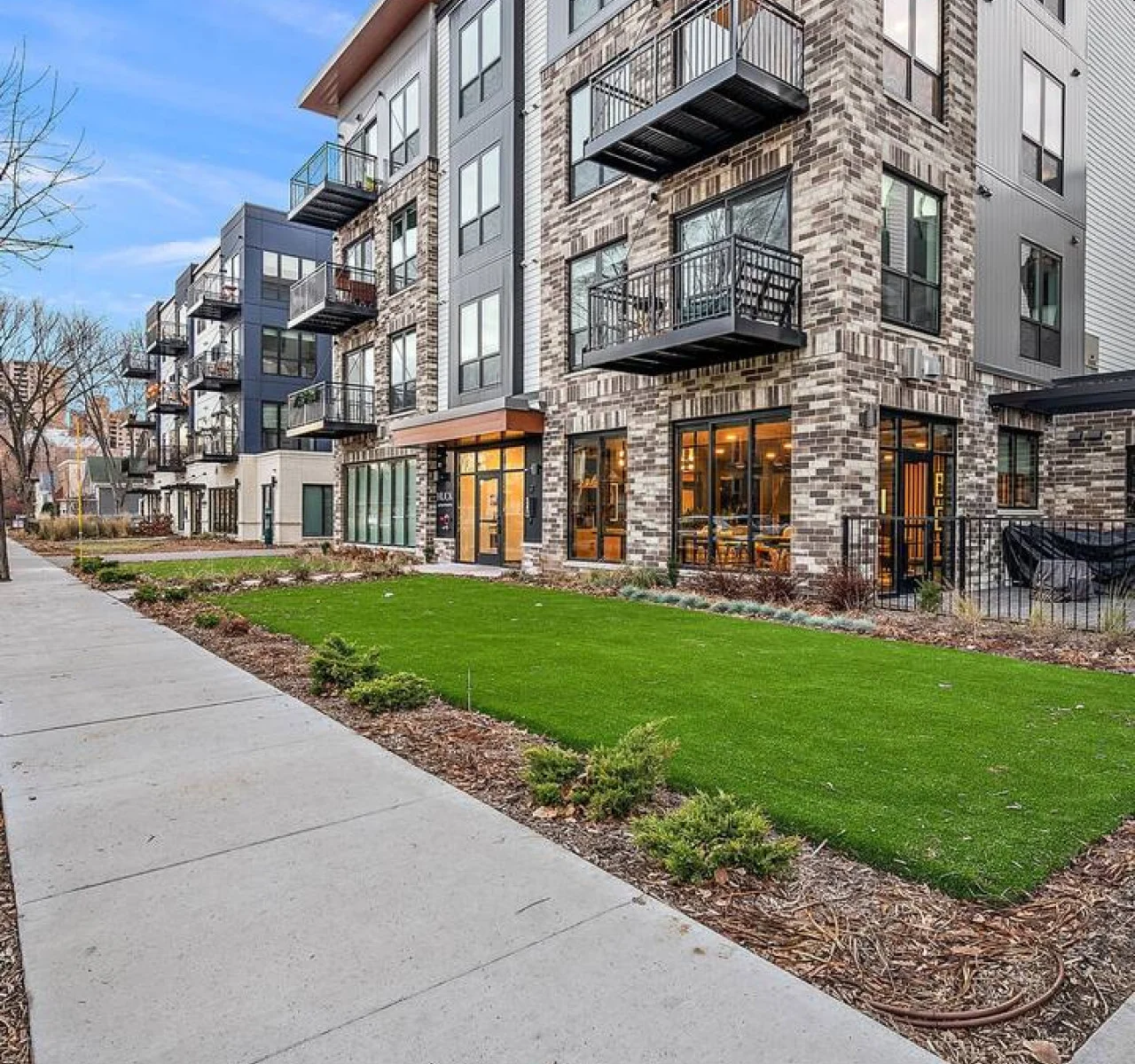 The house’s exterior is a blend of modern and classic design elements, creating a welcoming and stylish facade.