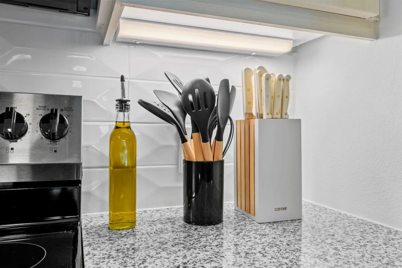 The kitchen invites you to experiment with new recipes, offering a stylish and practical space to cook and create.