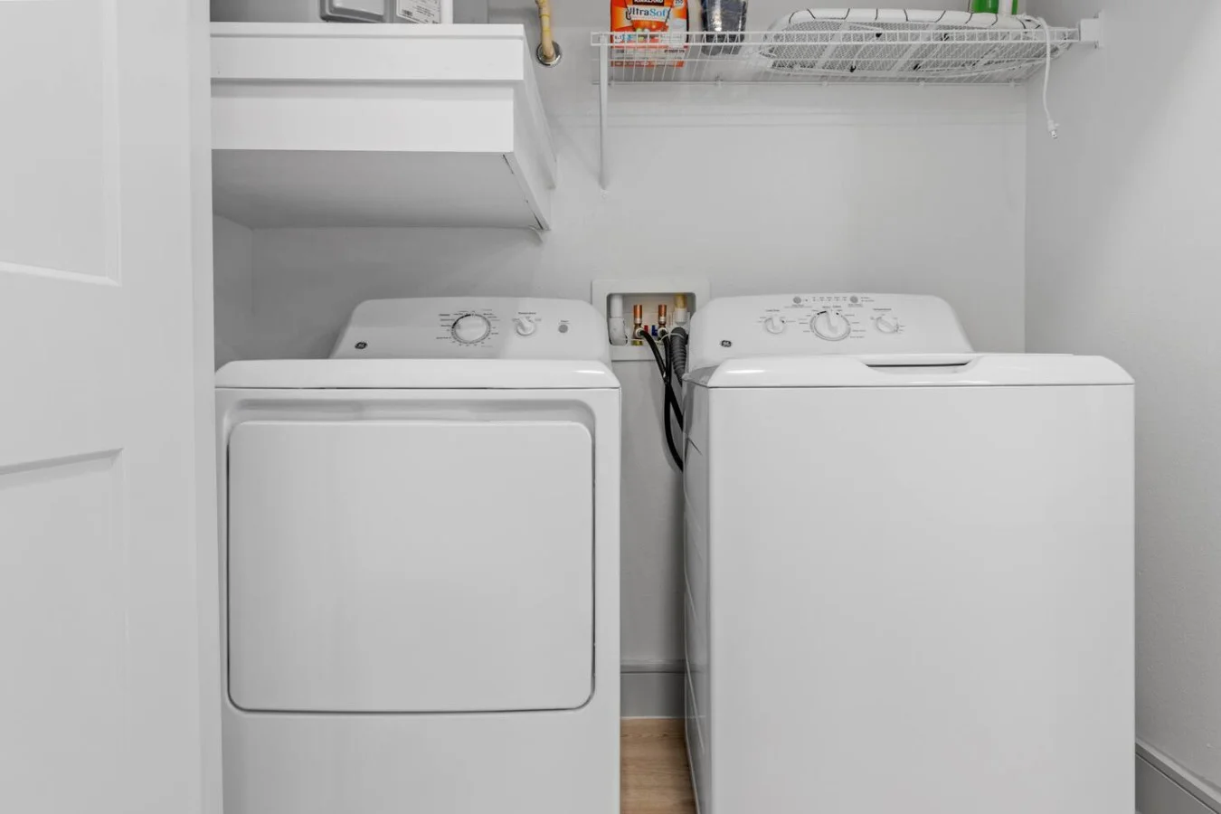With state-of-the-art appliances and generous storage, this laundry room makes keeping things neat effortless.