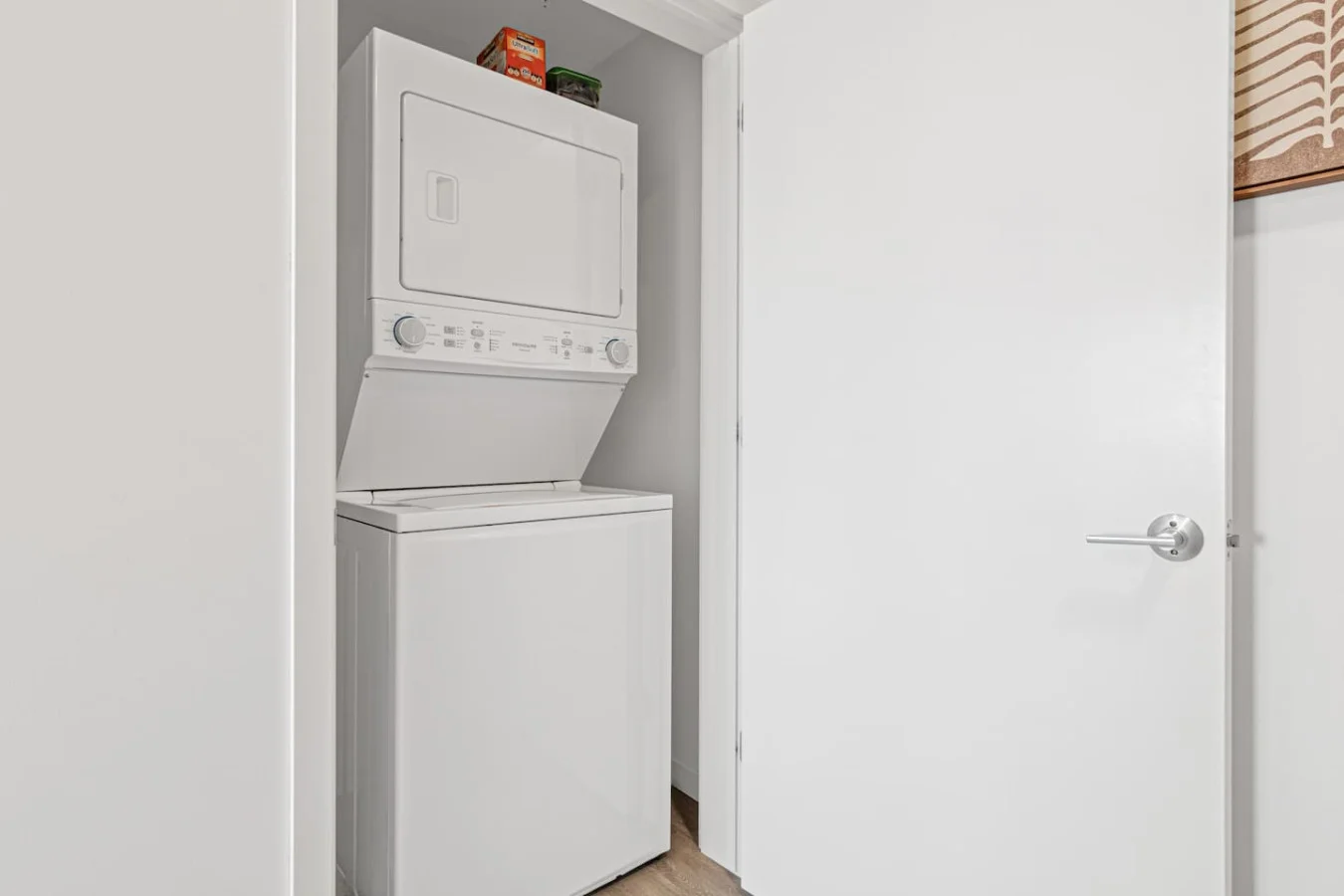 Laundry room with a washer, dryer, and folding area, offering all the convenience you need for a comfortable extended stay.