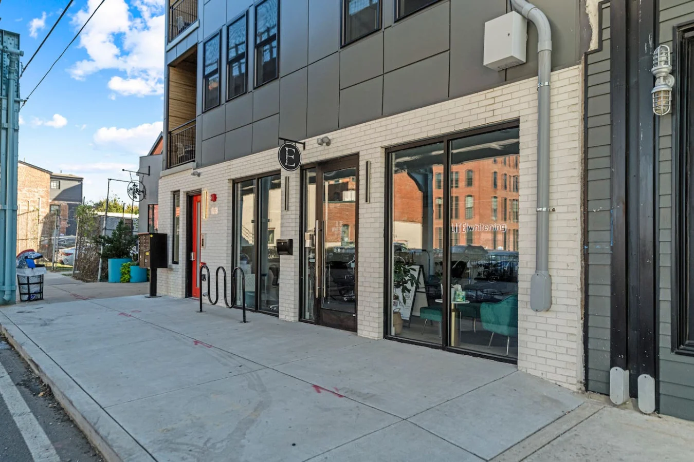 The house’s exterior is a blend of modern and classic design elements, creating a welcoming and stylish facade.