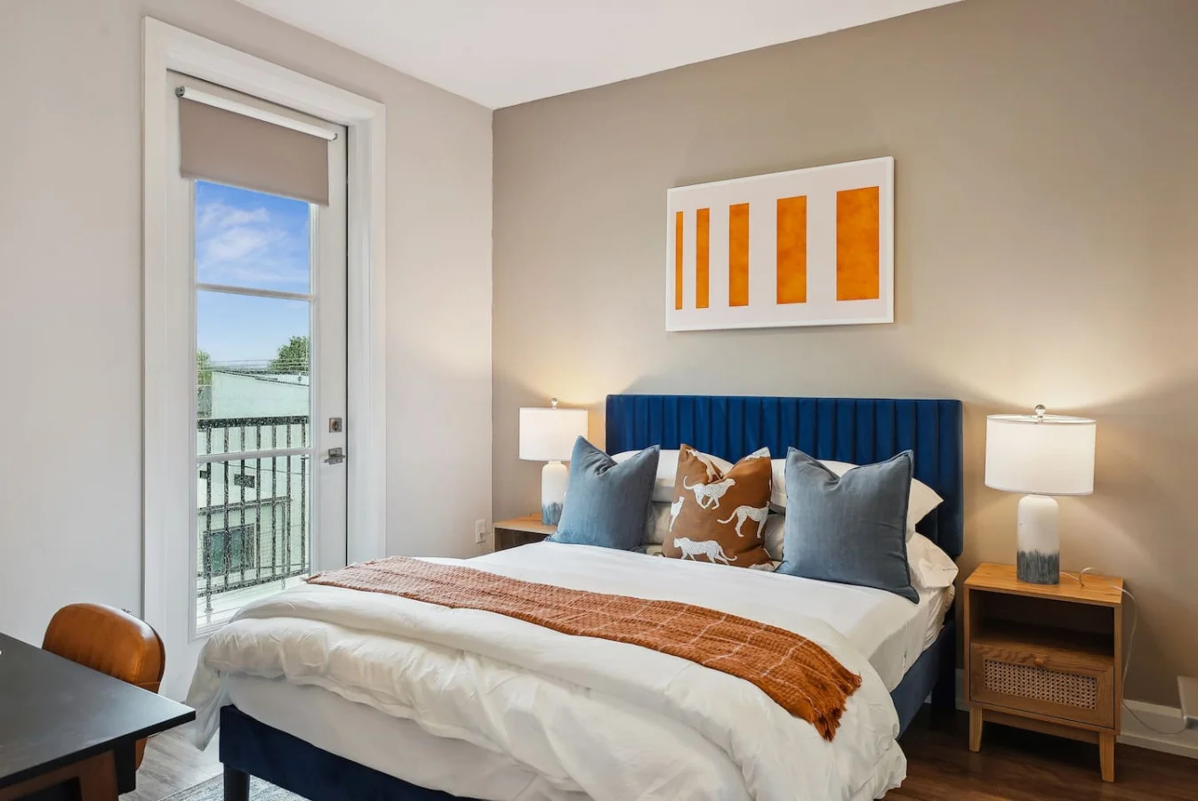 The bedroom’s serene ambiance invites you to relax, with a plush bed that promises a restful night's sleep.