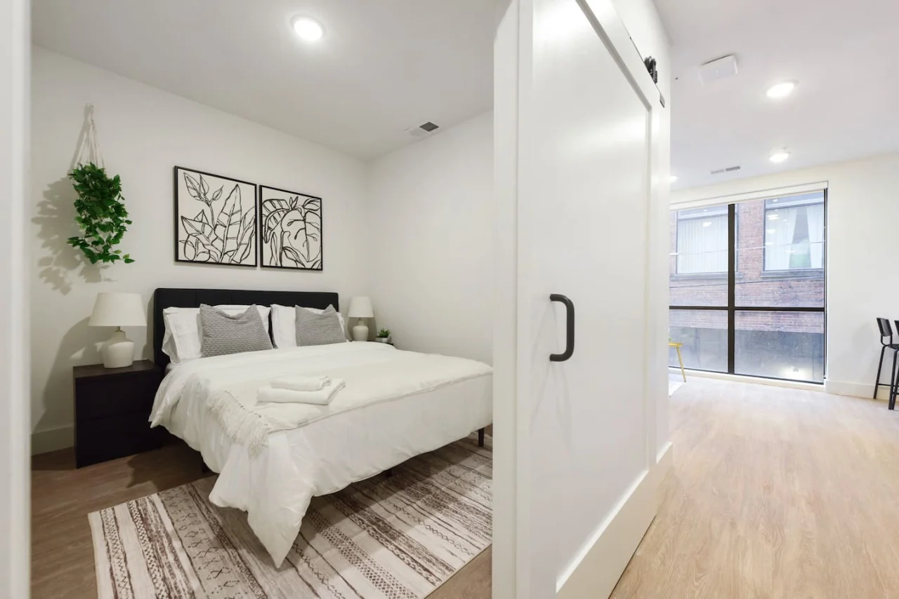 The bedroom’s serene ambiance invites you to relax, with a plush bed that promises a restful night's sleep.
