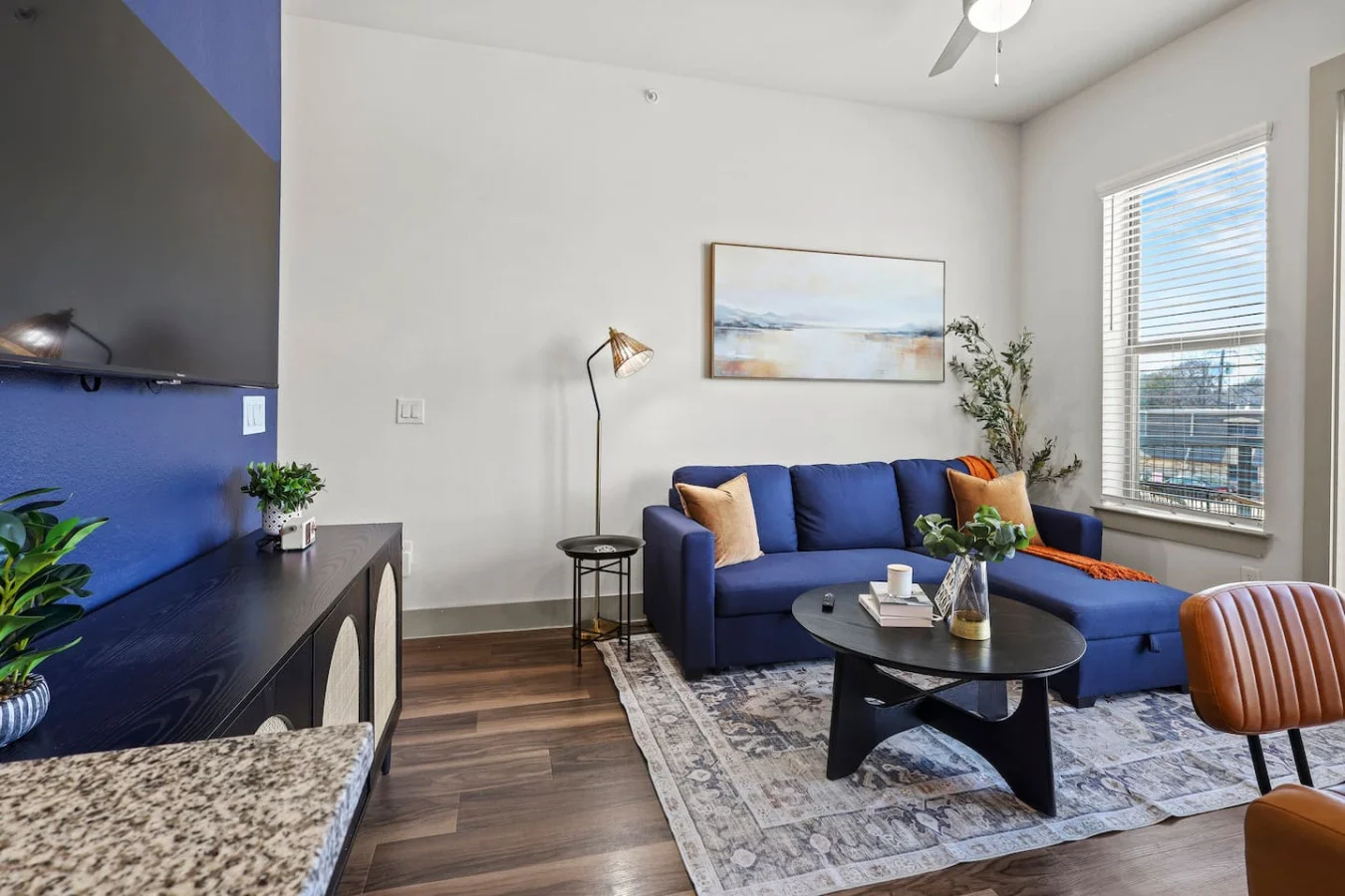 As you take a seat in the living room, the comfortable furniture and tasteful design make it easy to unwind.
