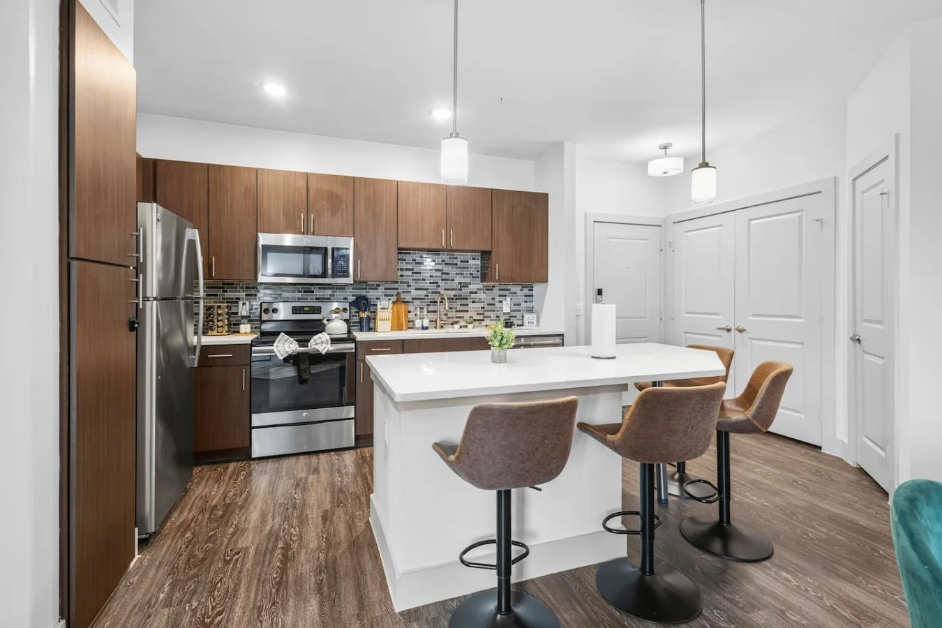 The heart of the home, where conversations flow as freely as the coffee.