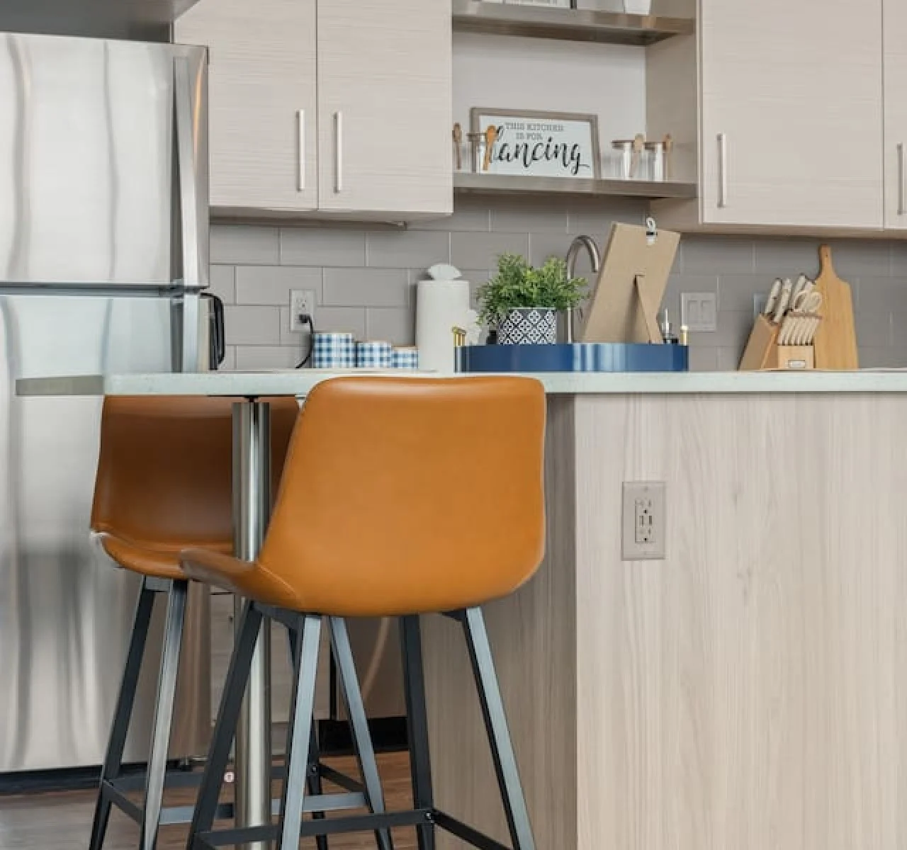 As you approach kitchen the elegant layout and well-stocked shelves make it the ideal spot to relax.