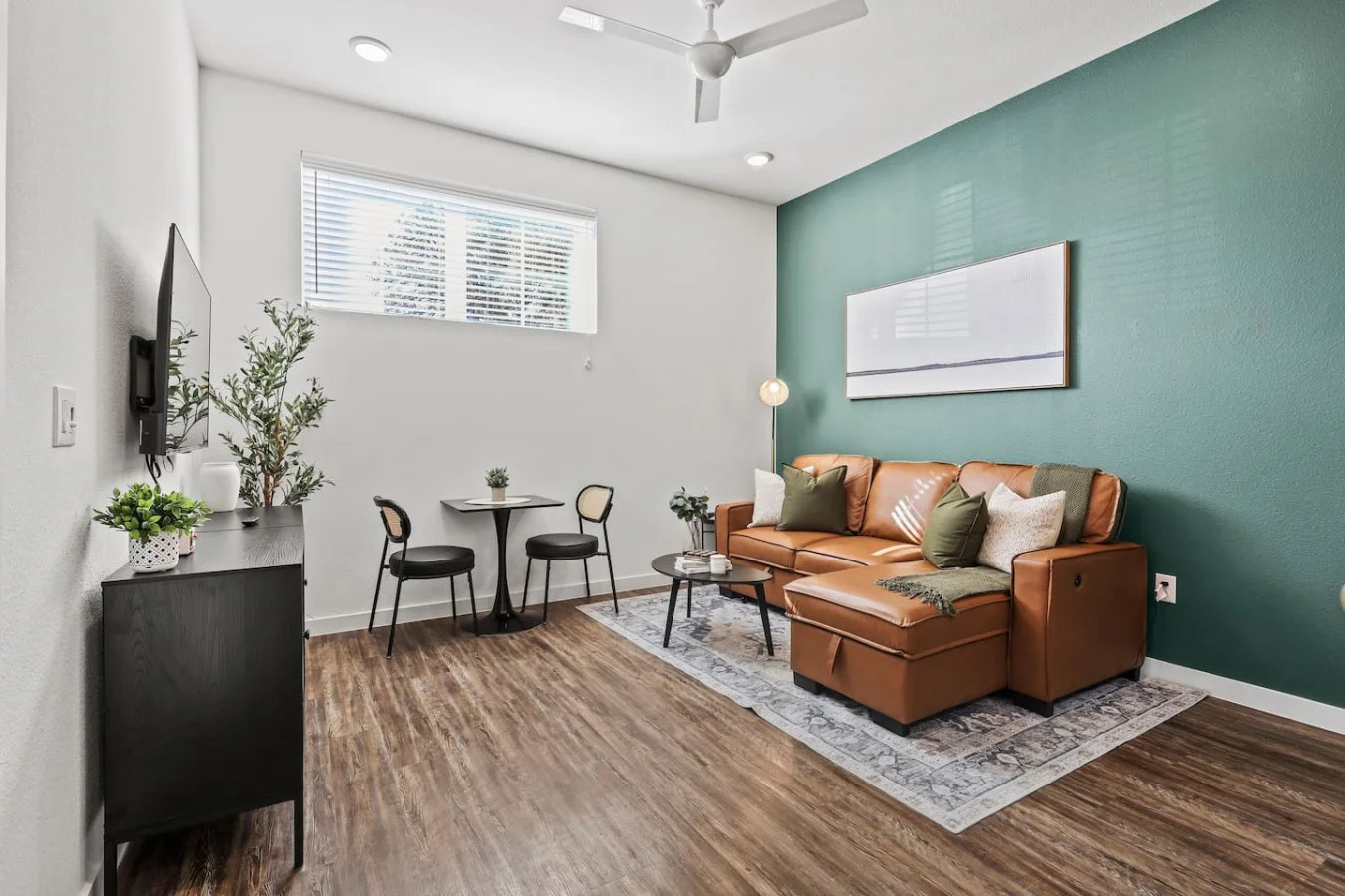 As you take a seat in the living room, the comfortable furniture and tasteful design make it easy to unwind.