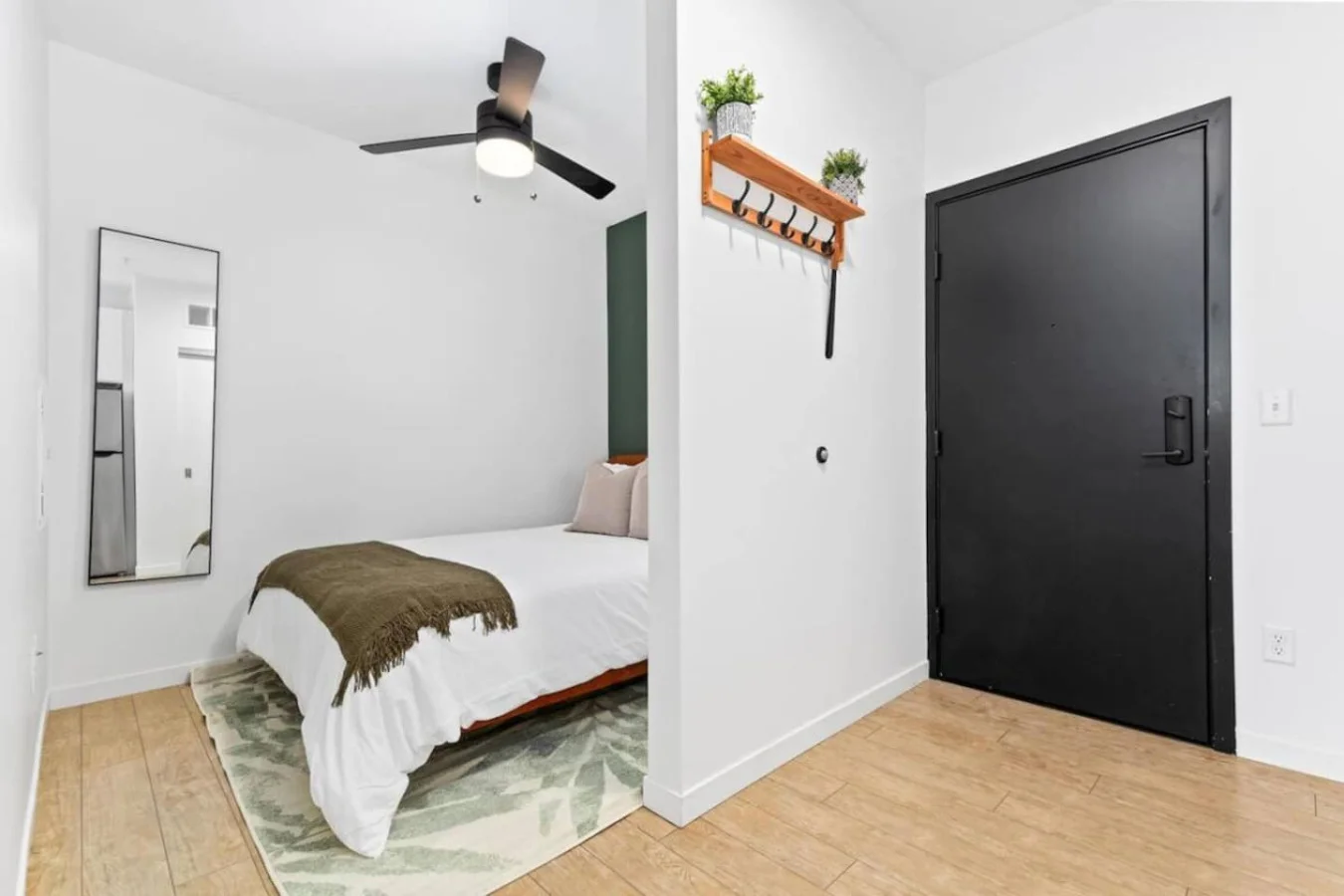 As you enter the bedroom, the comfortable bedding and peaceful atmosphere create the perfect retreat from the day.