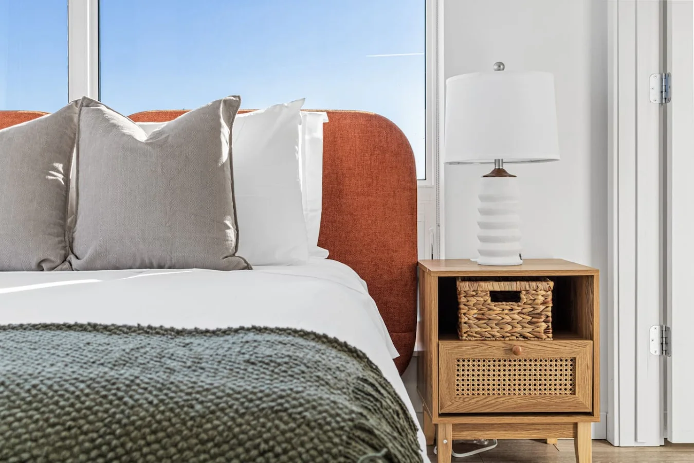 The bedroom’s serene ambiance invites you to relax, with a plush bed that promises a restful night's sleep.