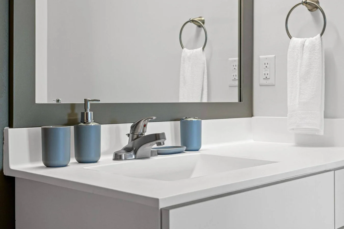 You feel a sense of calm as you enter the bathroom, where the thoughtful design and high-quality materials create a serene environment.