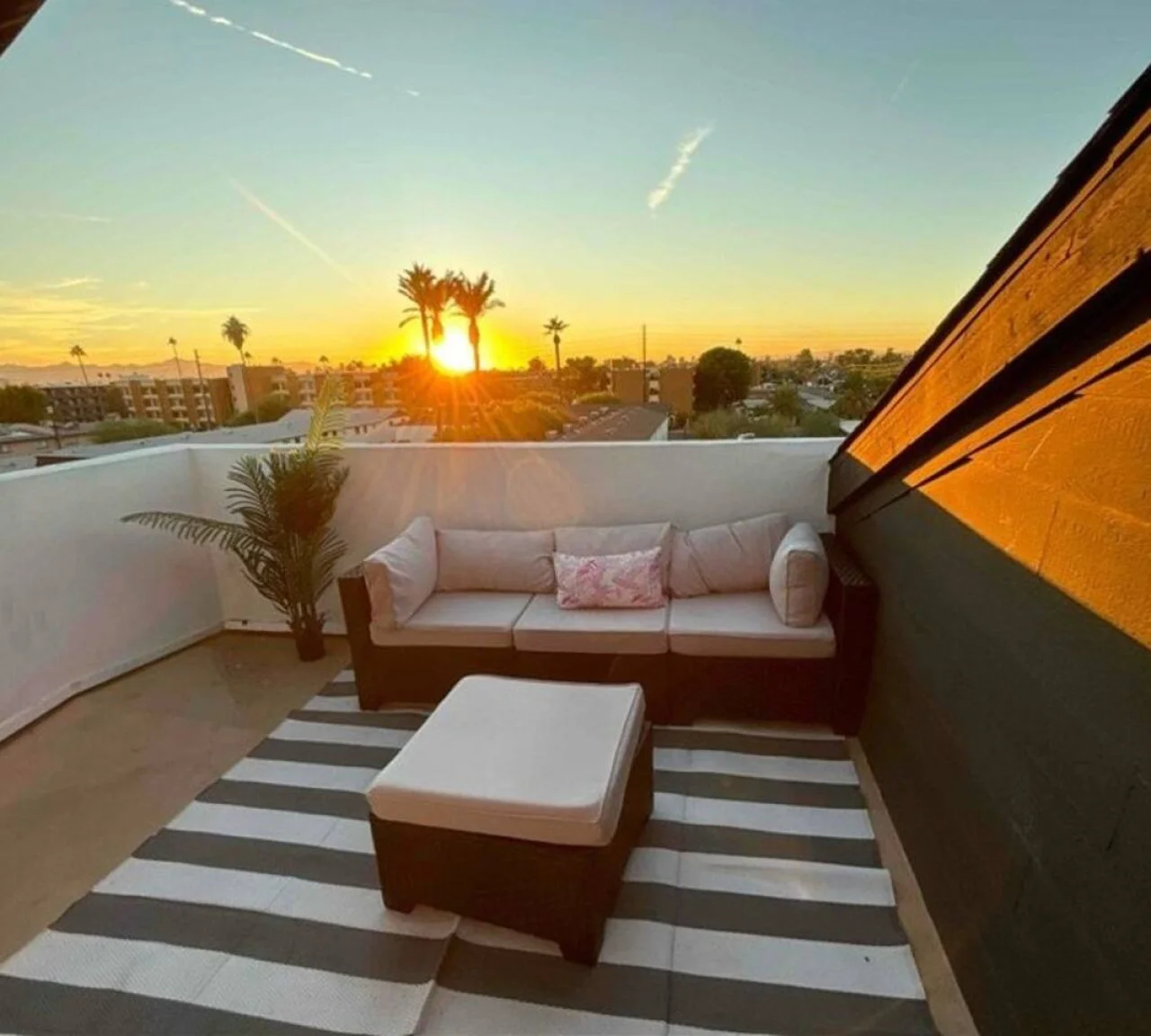 The rooftop areas’ plush seating beckons you to sink in and relax.