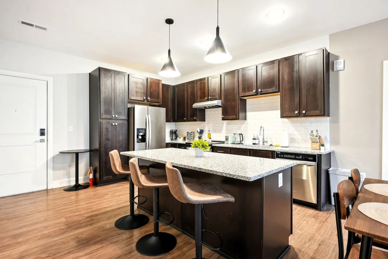 The dining area invites you to savor every moment, whether enjoying a quiet meal or hosting a festive gathering.