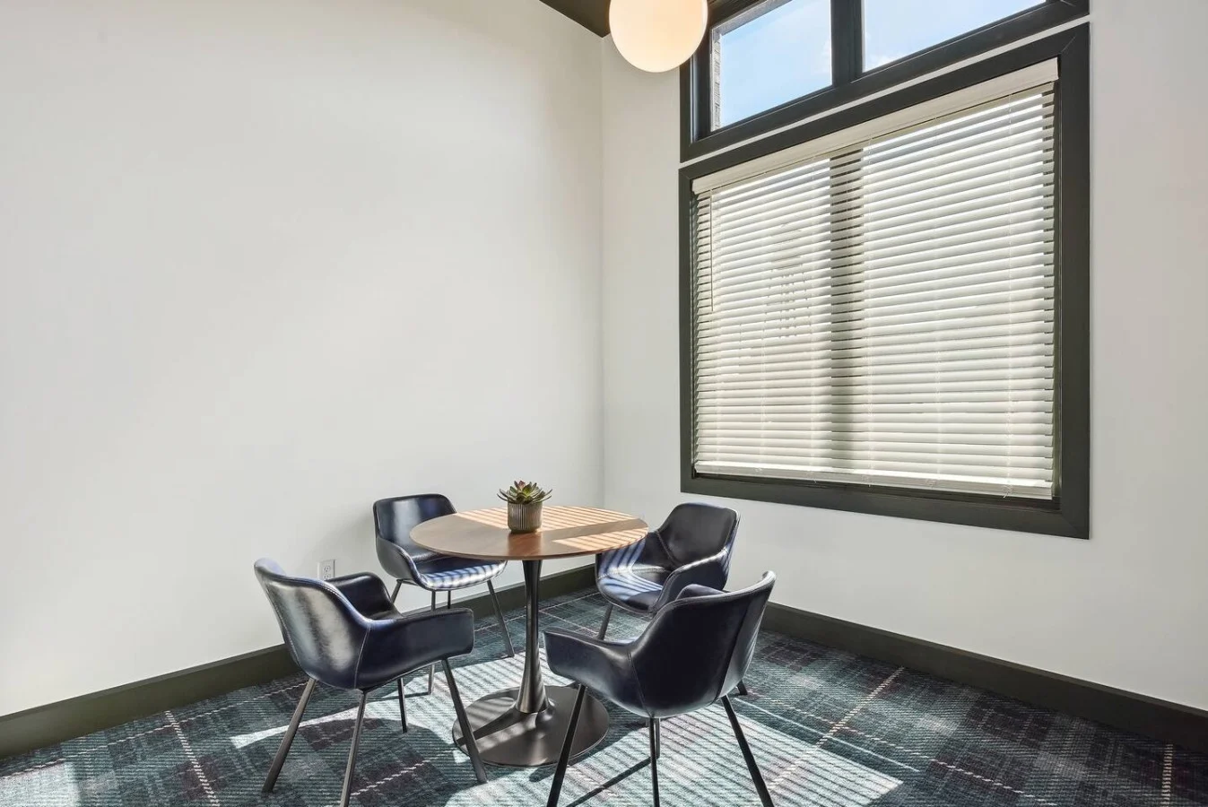 This cozy workspace area is perfect for productivity. Enjoy natural light, a comfortable chair, and a stylish desk setup. Ideal for work-from-home needs or planning your Dallas adventures.