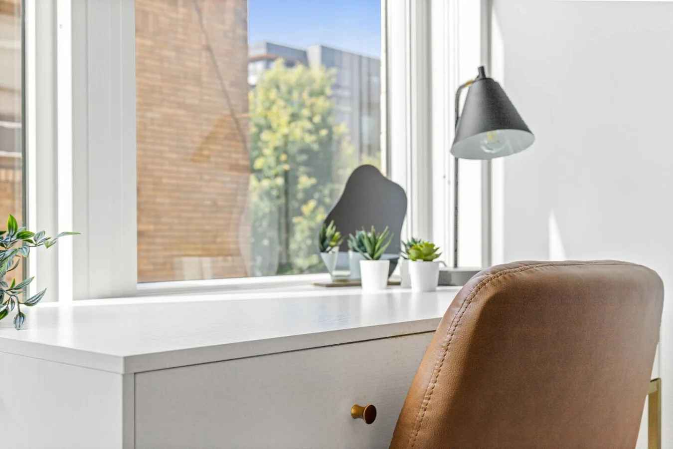 Your home office away from home! Bright, organized, and perfect for remote work.