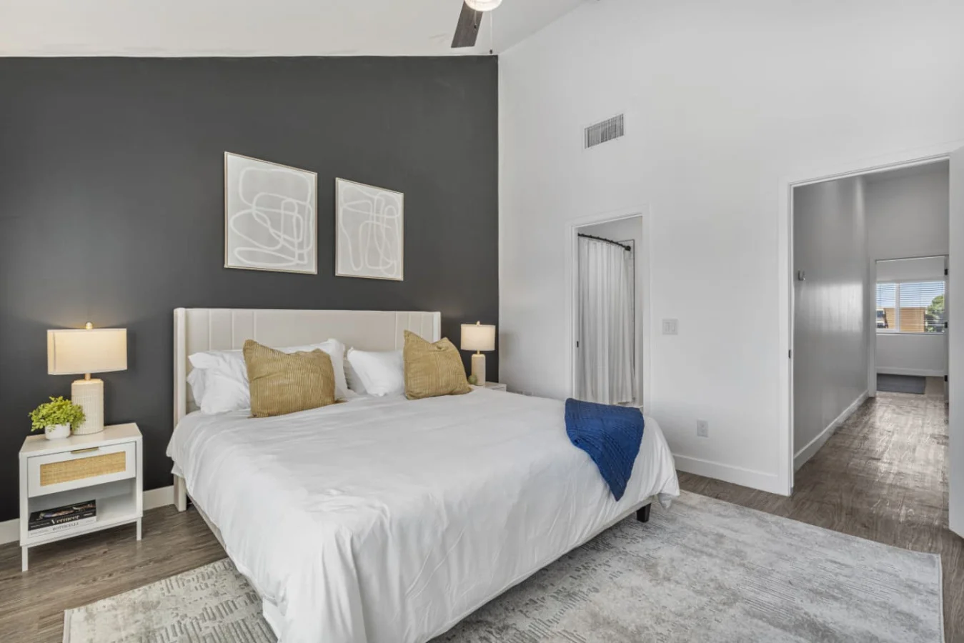 The bedroom’s serene ambiance invites you to relax, with a plush bed that promises a restful night's sleep.