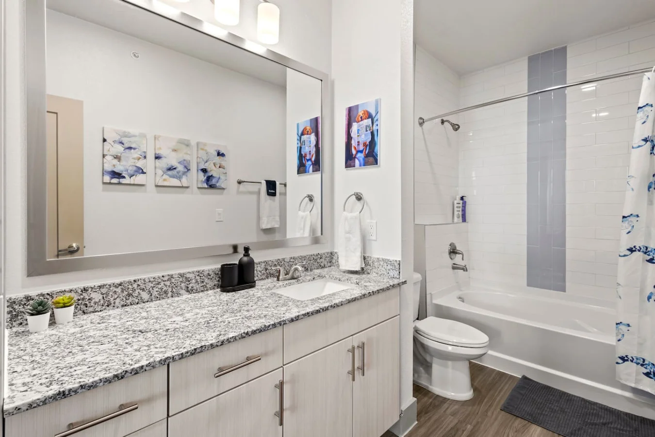 You feel a sense of calm as you enter the bathroom, where the thoughtful design and high-quality materials create a serene environment.