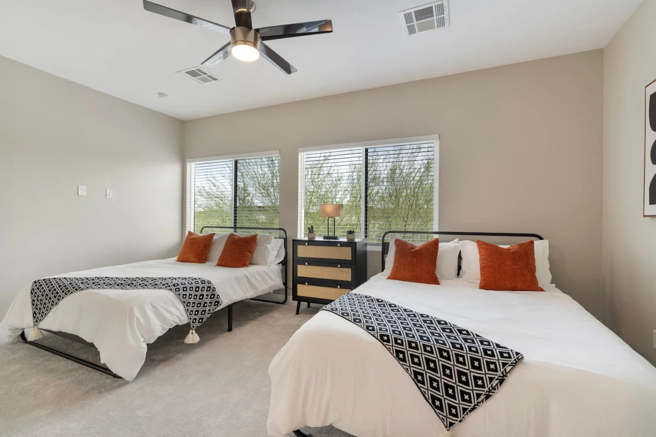 Spacious bedroom with stylish decor, perfect for unwinding after a day of exploring the local area.