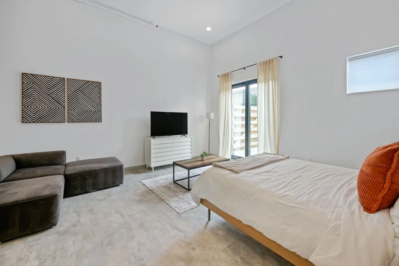 As you enter the bedroom, the comfortable bedding and peaceful atmosphere create the perfect retreat from the day.