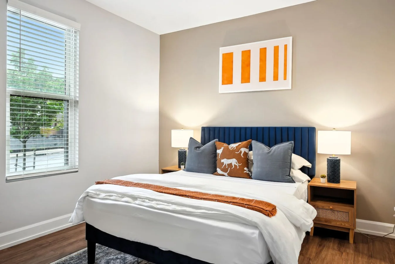 Bright and welcoming room with queen bed, perfect for families or friends traveling together.
