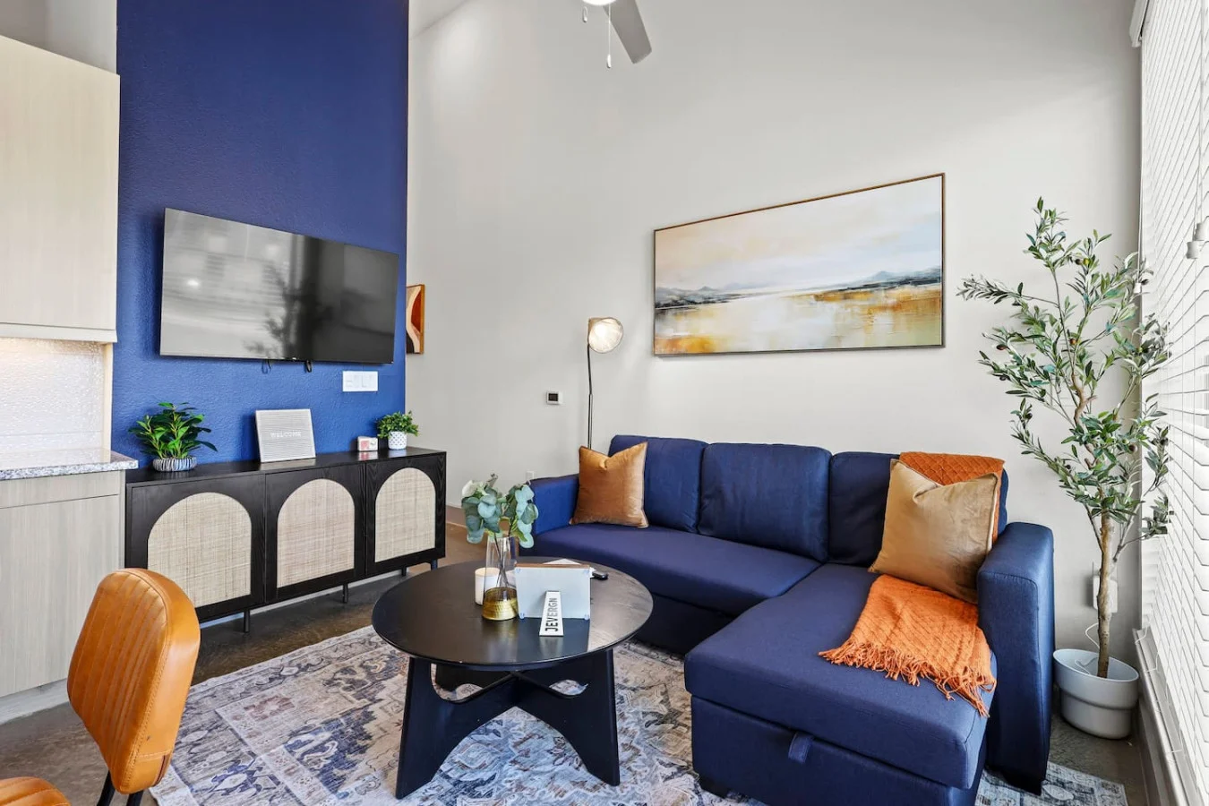 Relax in the living room and watch your favorite shows, lounging is a great way to unwind after a long day.