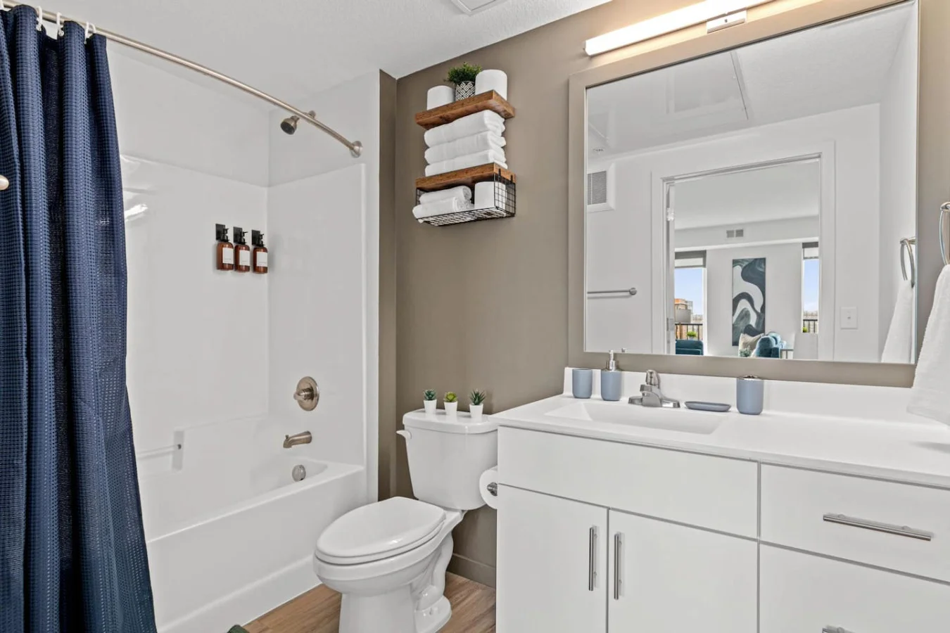 You feel a sense of calm as you enter the bathroom, where the thoughtful design and high-quality materials create a serene environment.