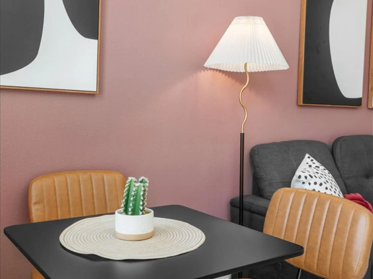 You feel a sense of peace as you step into the living room , with its inviting decor and soothing tones.