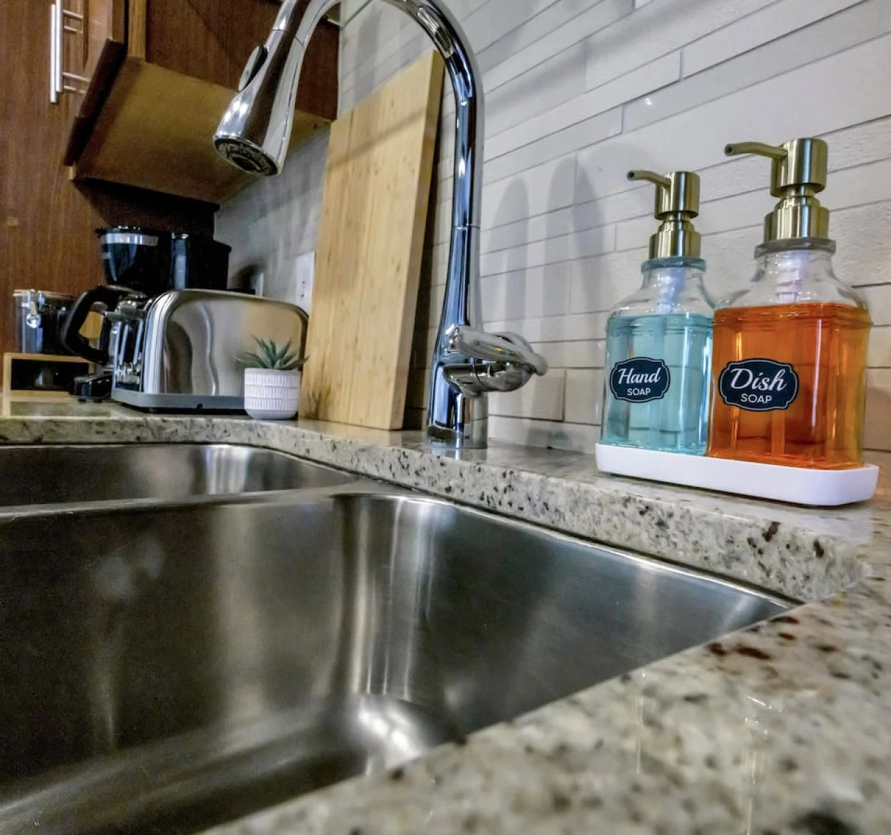 Fully equipped kitchen with all the tools you need for a perfect culinary experience. Enjoy the convenience of having everything at your fingertips!