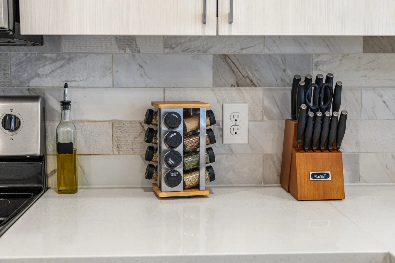 Everything you need to prepare a delicious meal, set against a stylish gray tile backdrop.