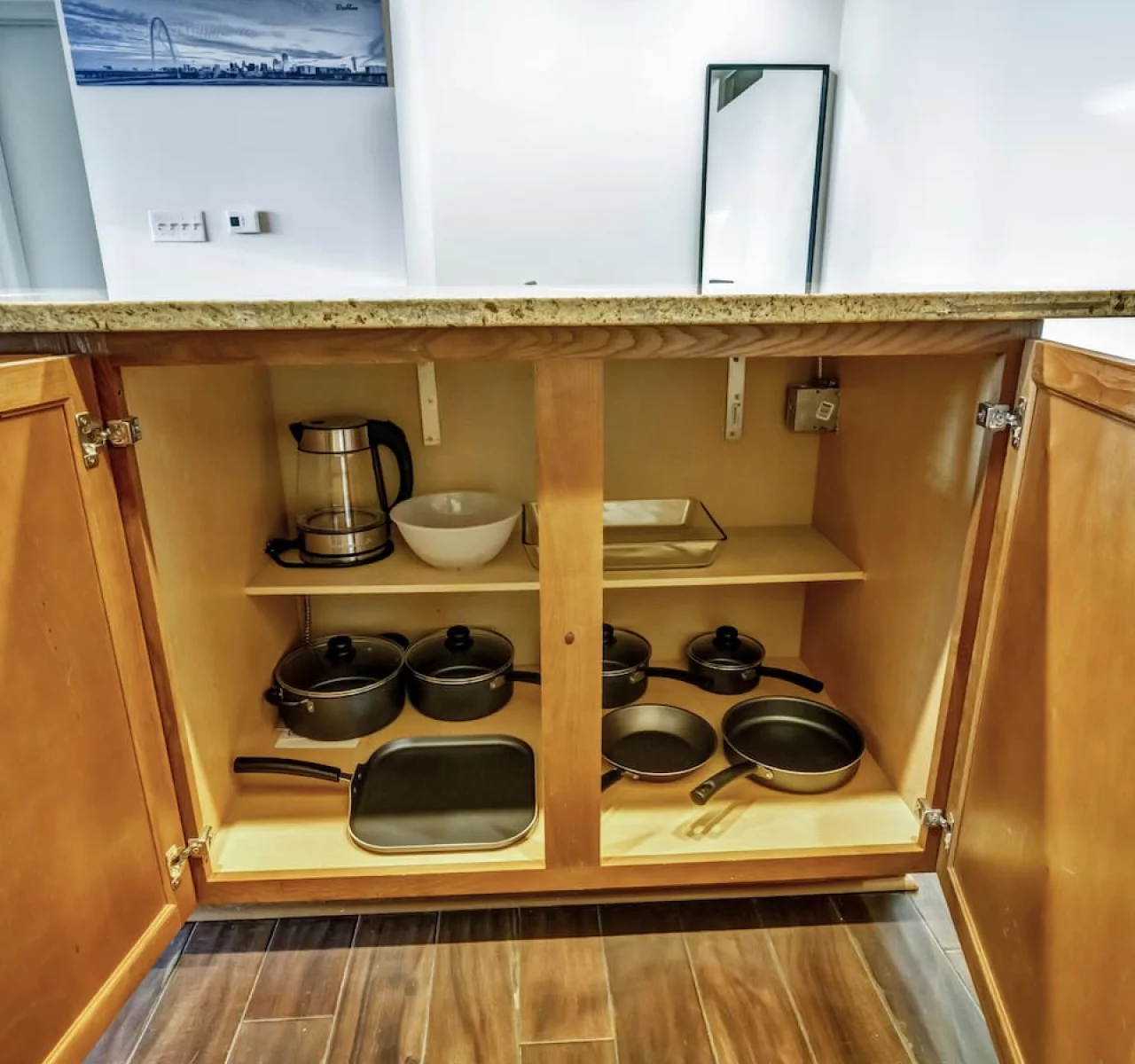 As you approach kitchen the elegant layout and well-stocked shelves make it the ideal spot to relax.