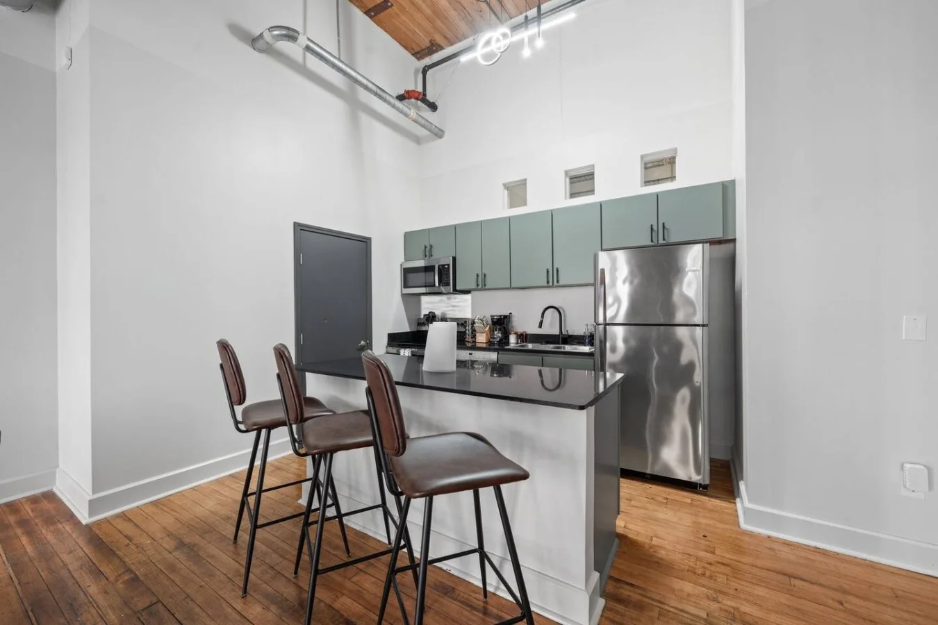 Contemporary kitchen space with breakfast bar for 3