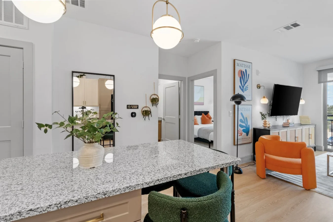 Open, airy layout with modern décor and a chic entertainment setup—ideal for entertaining and unwinding.
