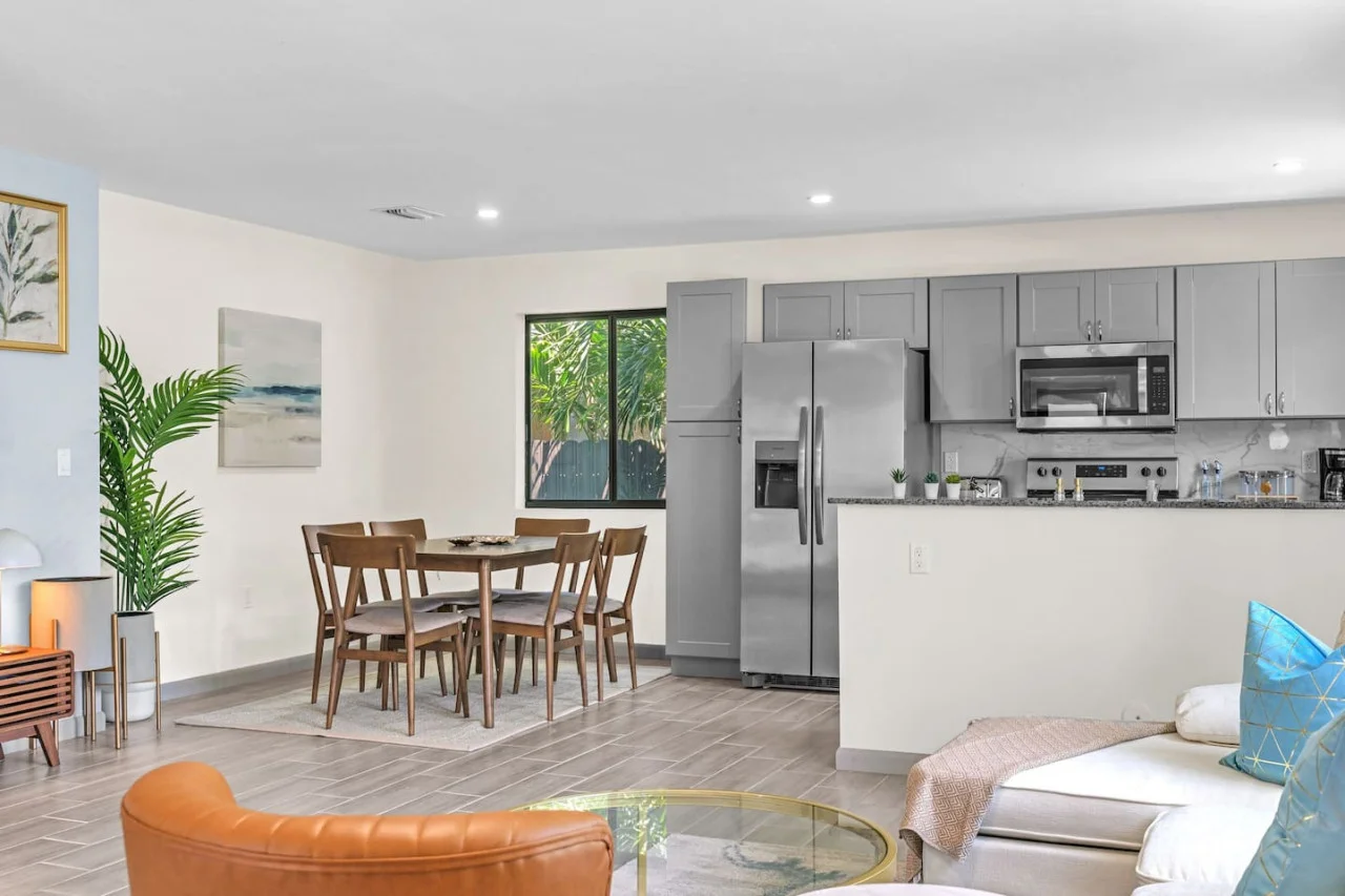 Dining space perfectly positioned between the kitchen and living area, creating a harmonious open floor plan.