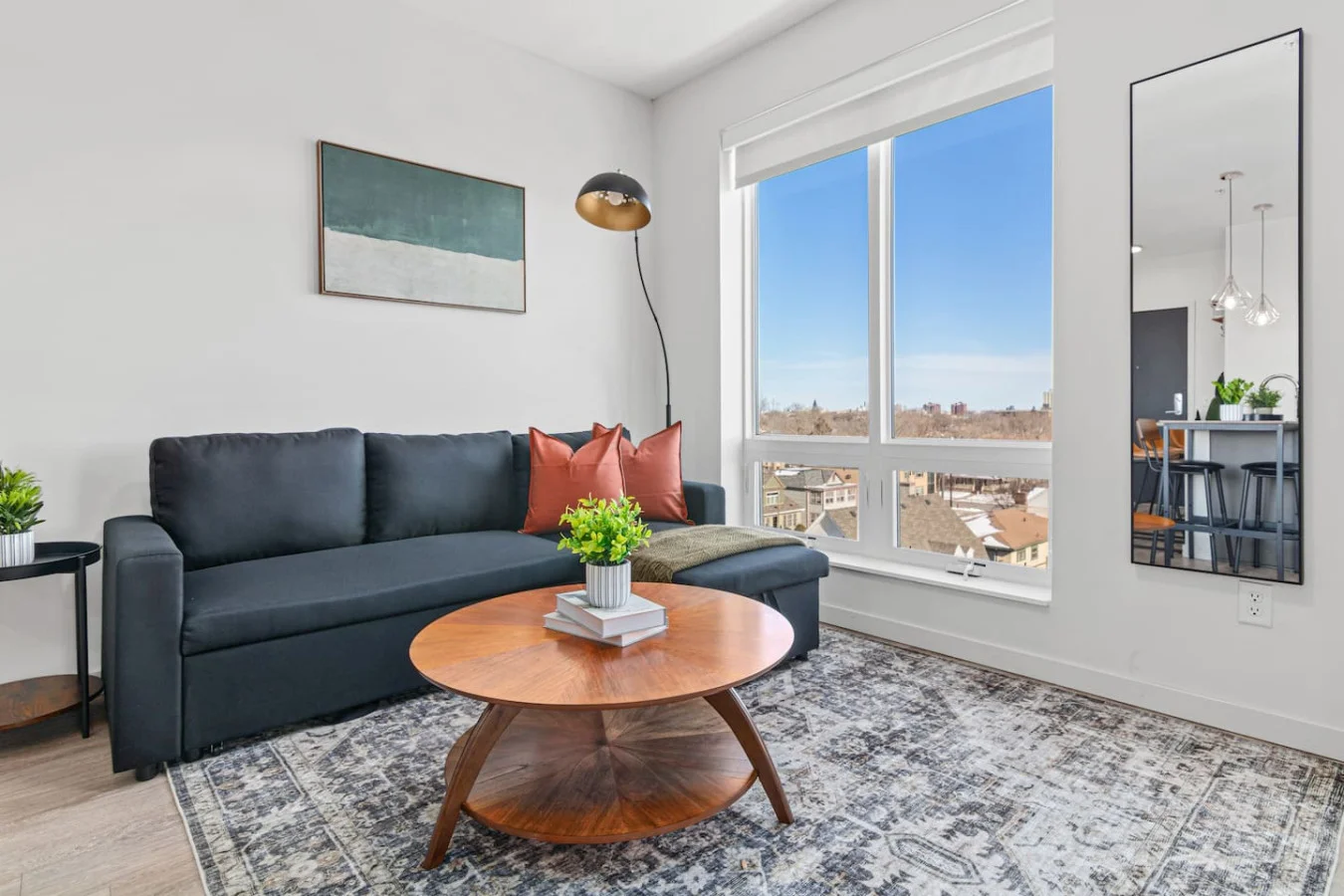 As you take a seat in the living room, the comfortable furniture and tasteful design make it easy to unwind.