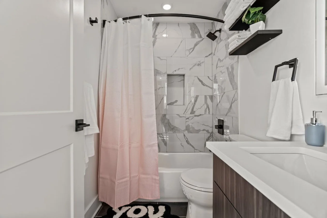 The bathroom is a private sanctuary, with a layout and features that make it the perfect place to rejuvenate.
