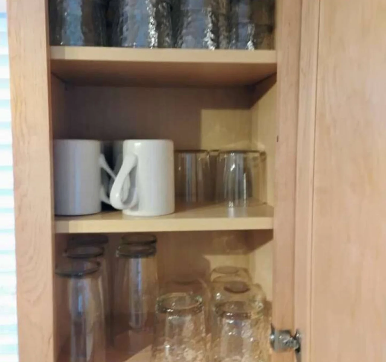 Glassware and mugs ready for coffee, wine, or evening drinks